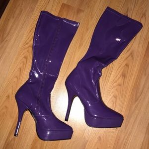 Never worn. Purple costume boots